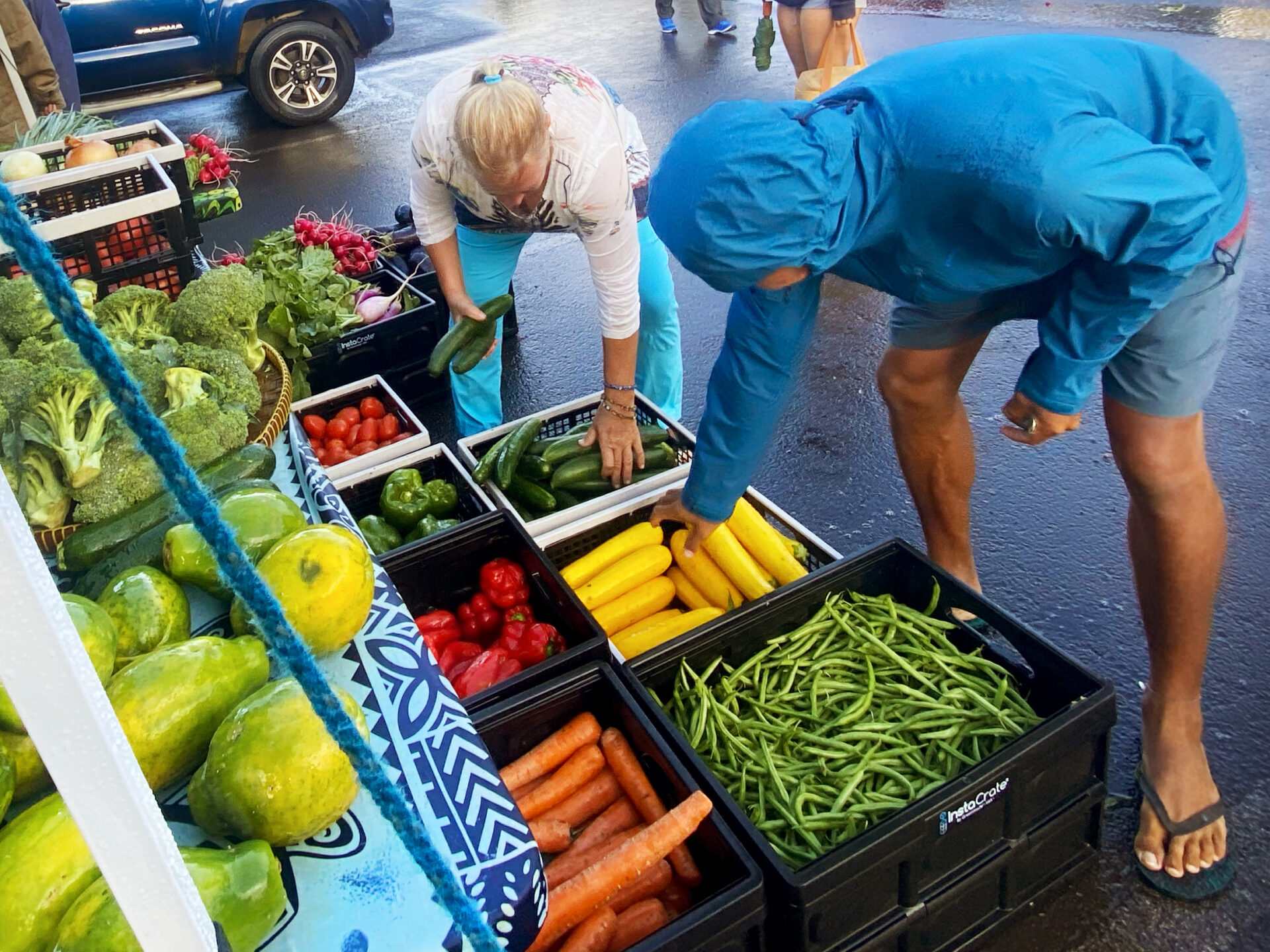 people purchasing veggies